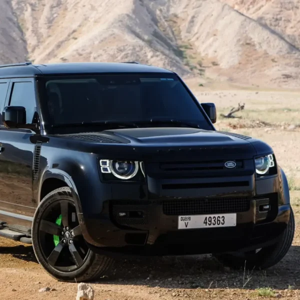 a picture of LAND ROVER DEFENDER 4 DOOR available for rental in dubai with front side view