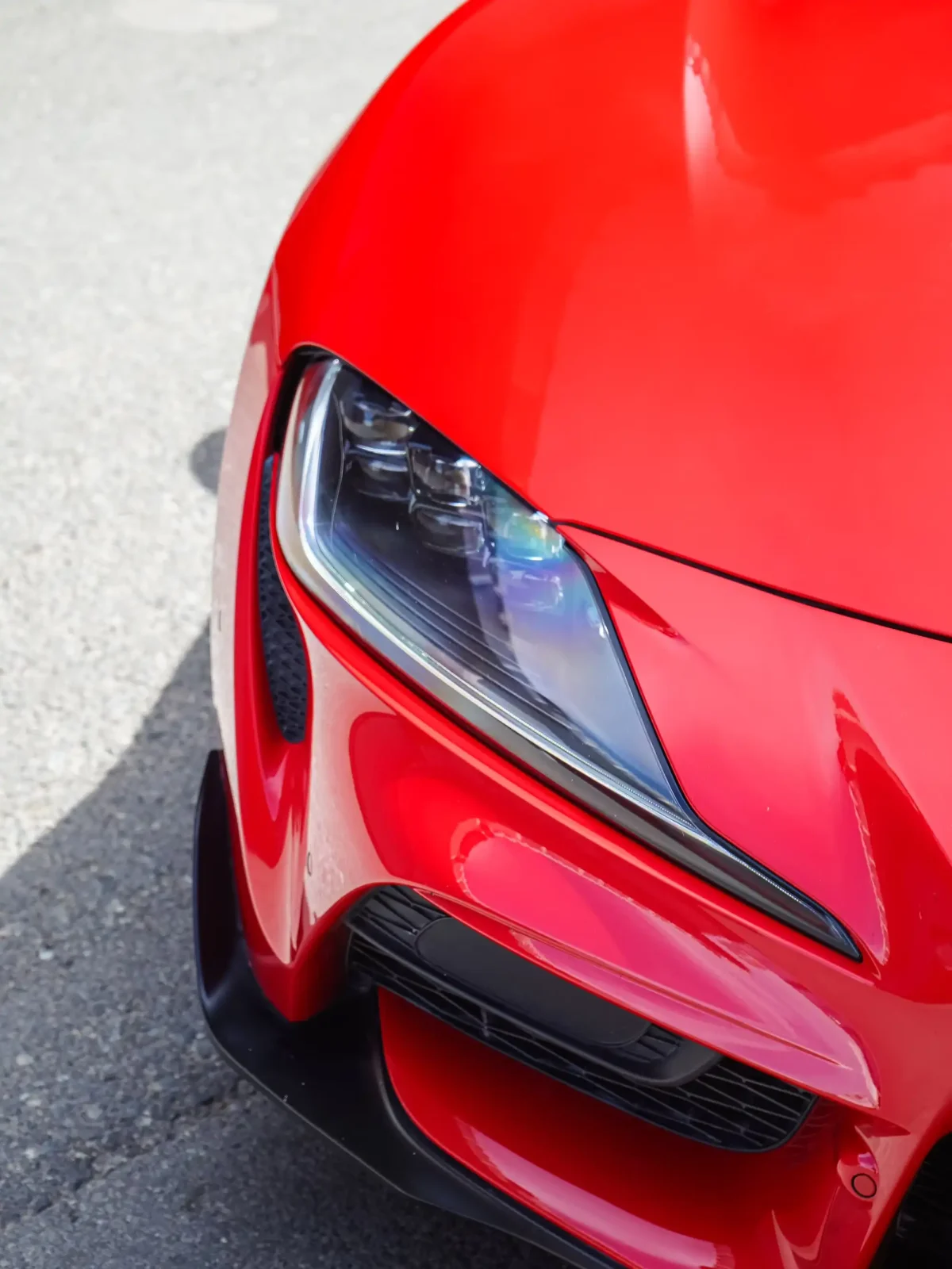 a picture of TOYOTA SUPRA GR available for rental in dubai with head light view