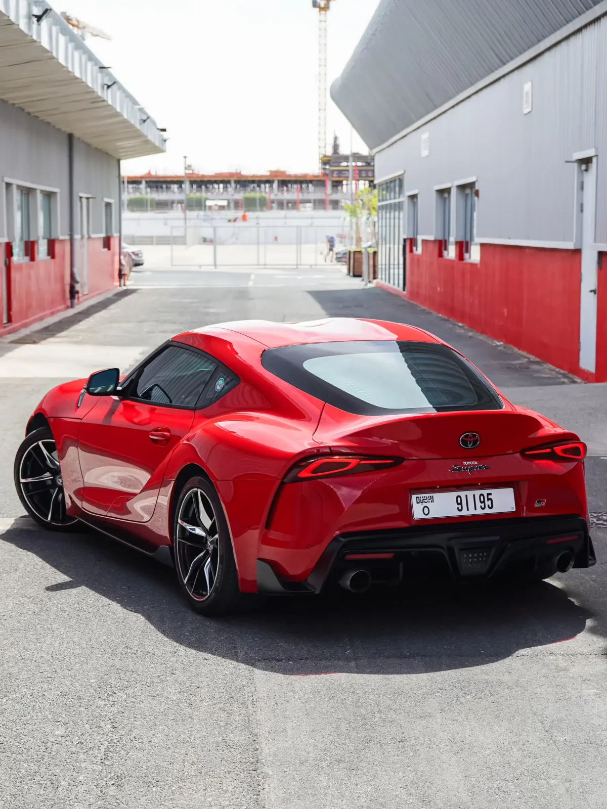 a picture of TOYOTA SUPRA GR available for rental in dubai with rear tail gate side view