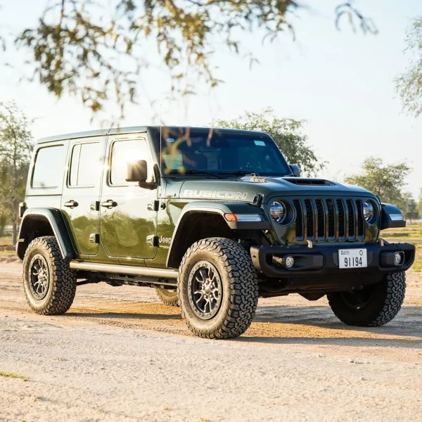 a picture of Jeep Wrangler available for rental in dubai with front side view