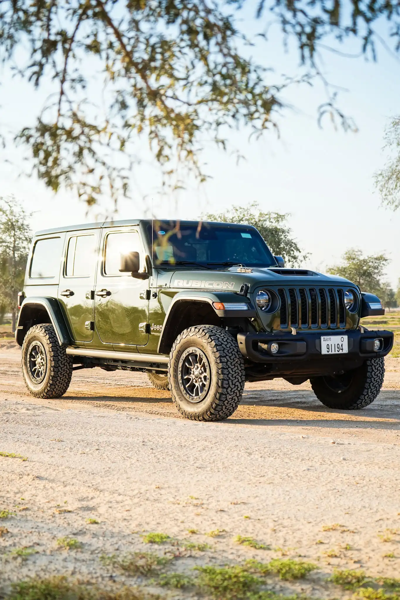 a picture of Jeep Wrangler available for rental in dubai with front side view