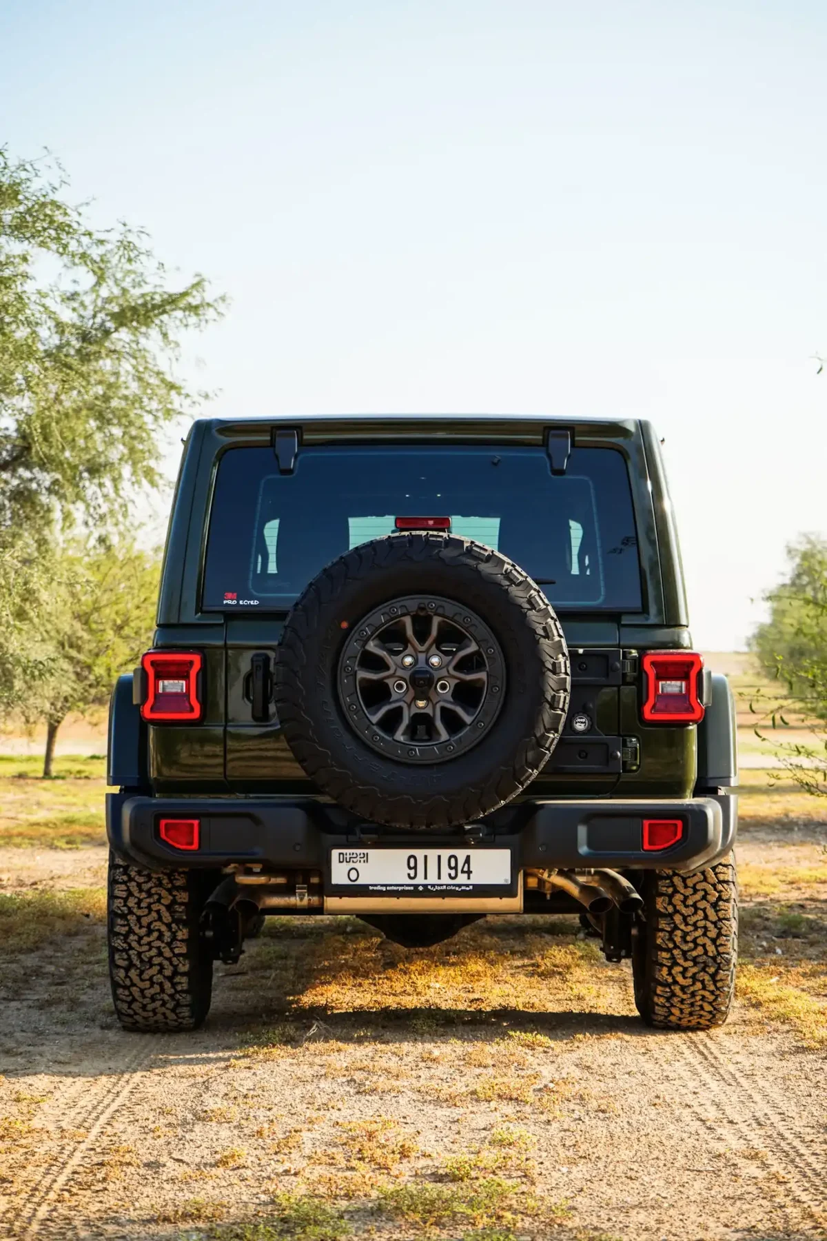 a picture of Jeep Wrangler available for rental in dubai with ftail gate view