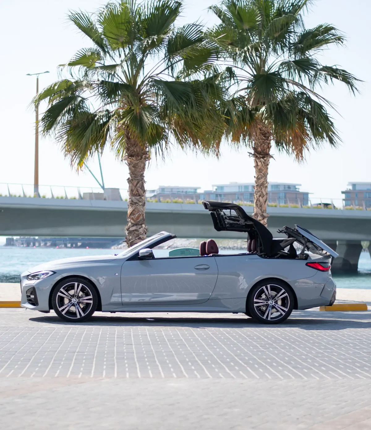 a picture of BMW 4 SERIES available for rental in dubai with open roof top view