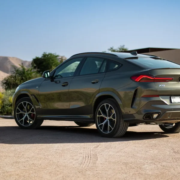 a picture of BMW X6 available for rental in dubai with rear side view