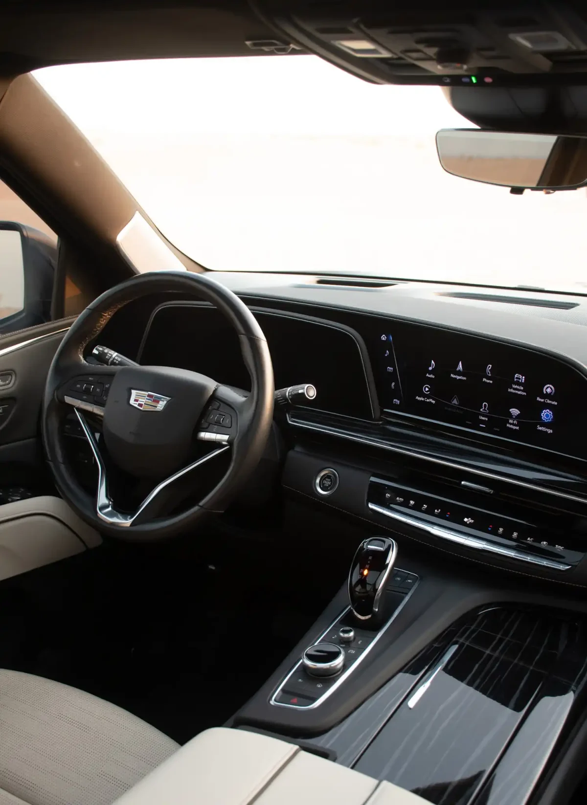 a picture of CADILLAC ESCALADE available for rental in dubai with central console view