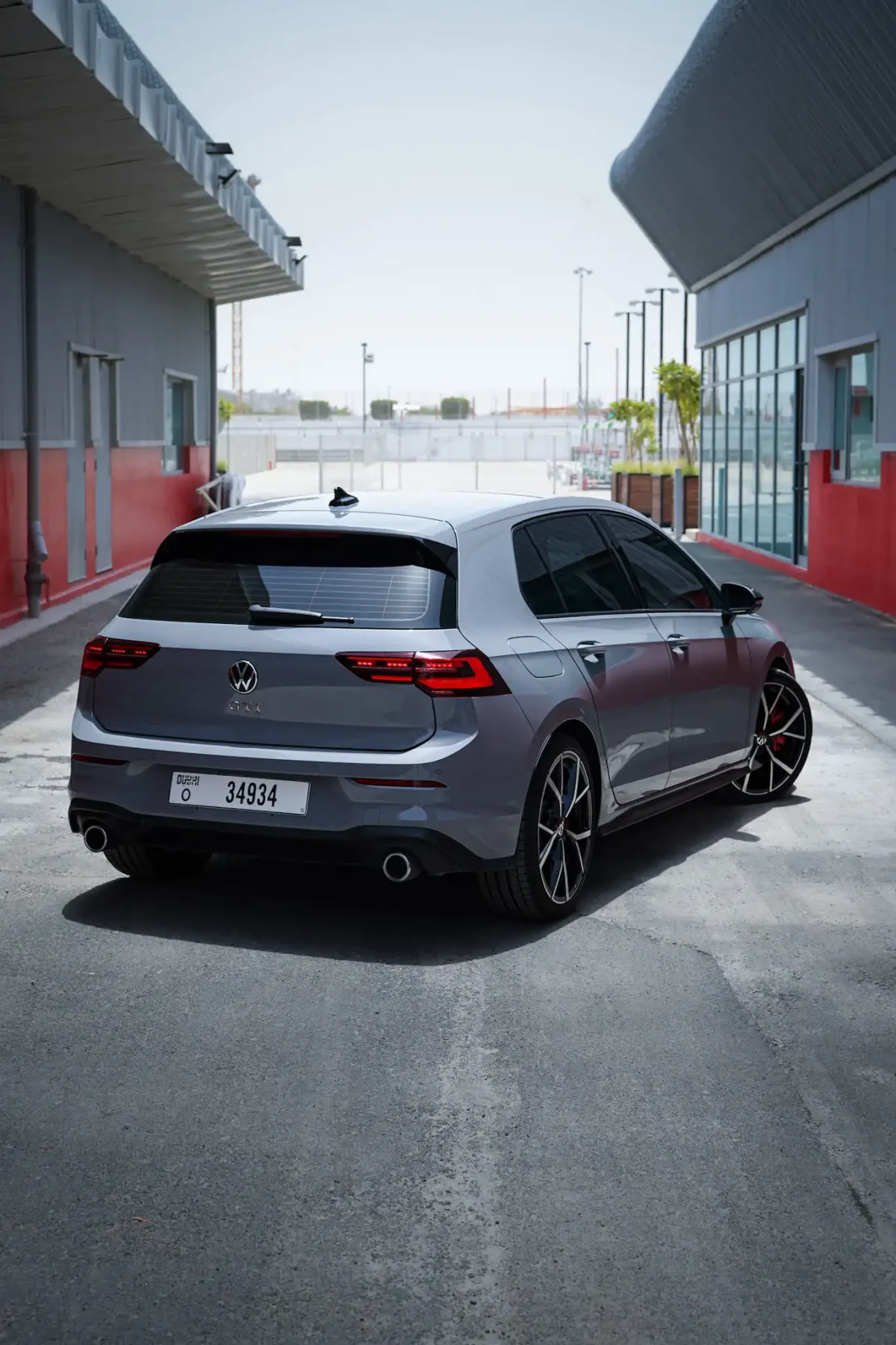 a picture of VOLKSWAGEN GOLF GTI available for rental in dubai with rear tail gate side view