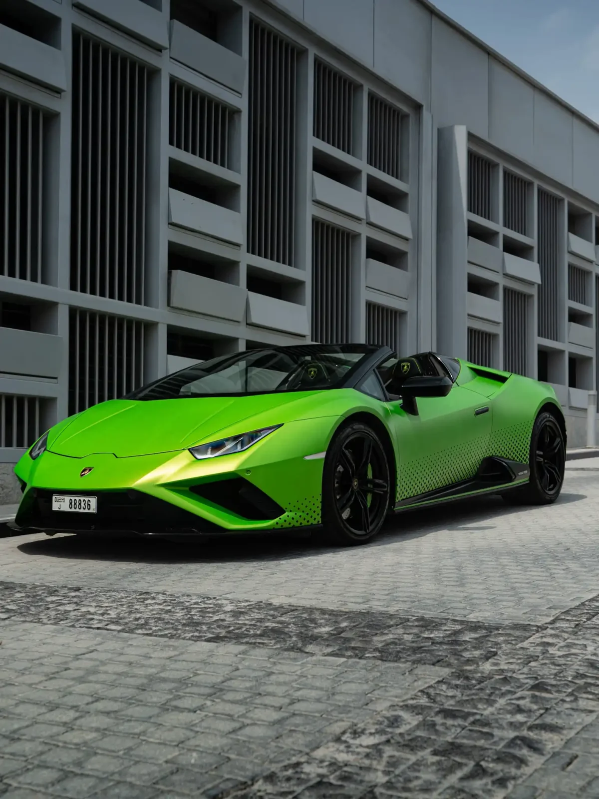 a picture of LAMBORGHINI HURACAN EVO SPYDER available for rental in dubai with front side view