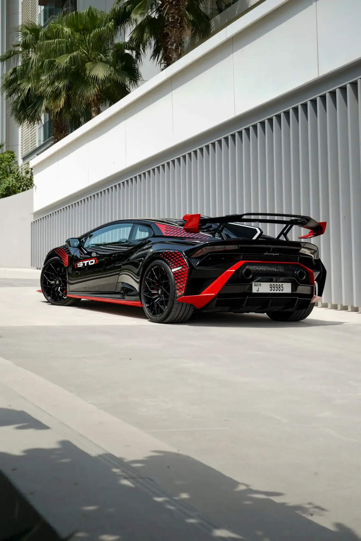 a picture of LAMBORGHINI STO available for rental in dubai parked outside