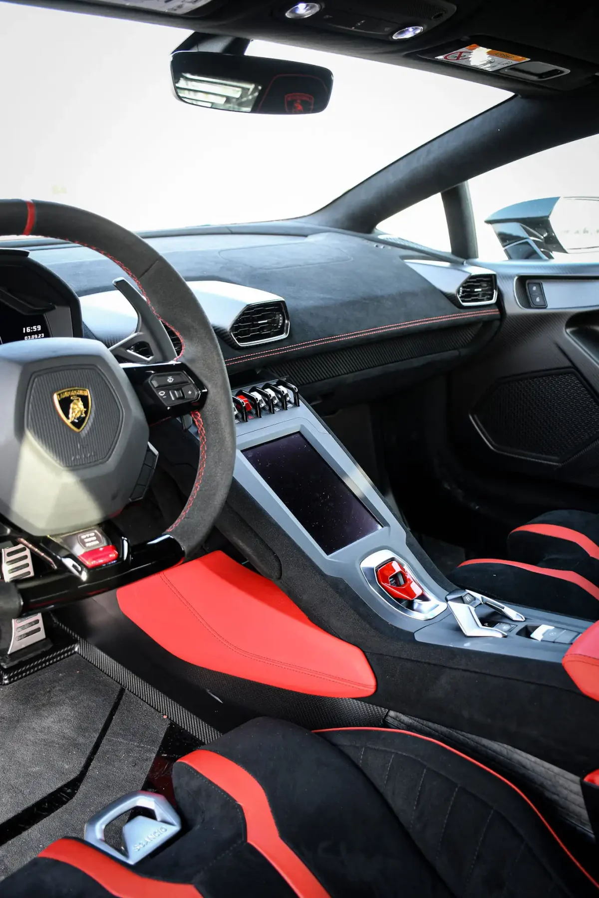 a picture of LAMBORGHINI STO available for rental in dubai with central console view