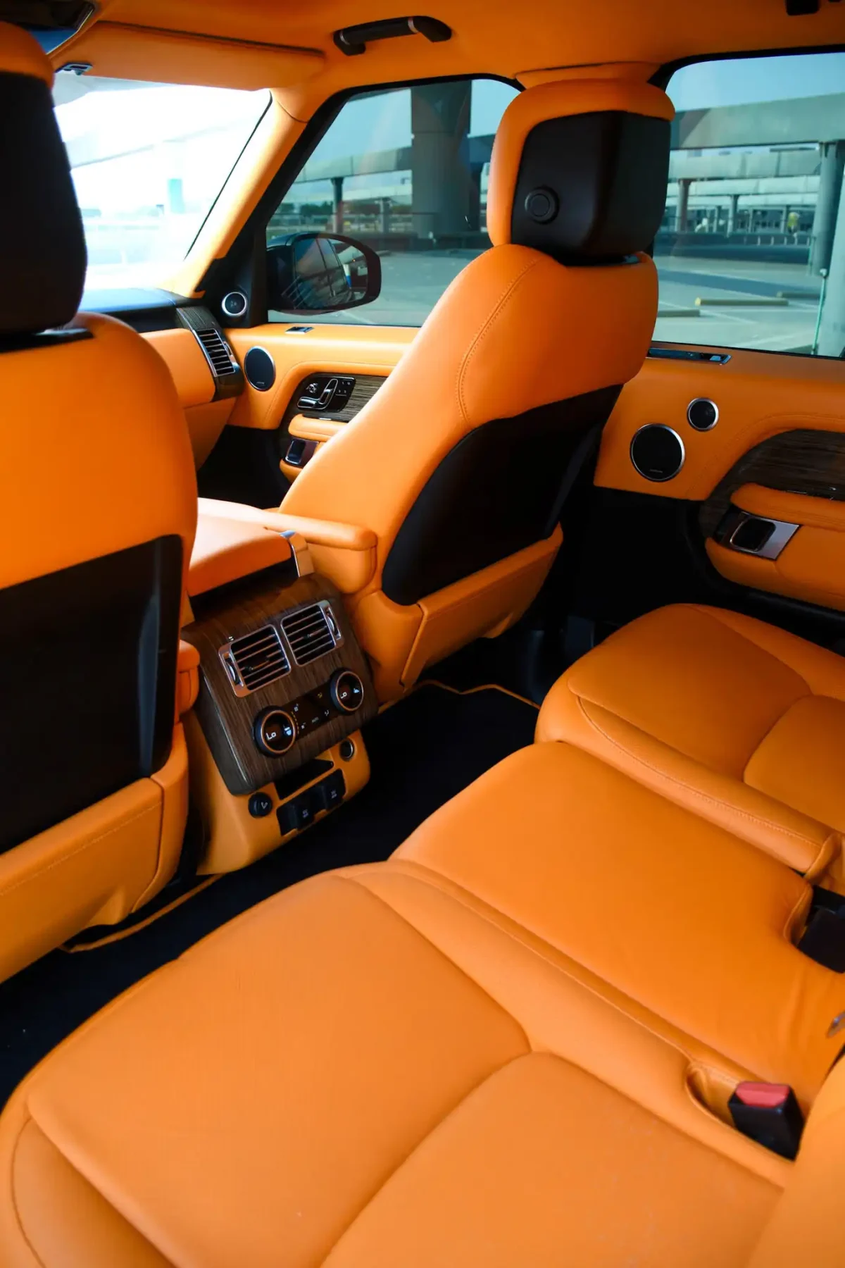 a picture of RANGE ROVER VOGUE available for rental in dubai with rear seat view