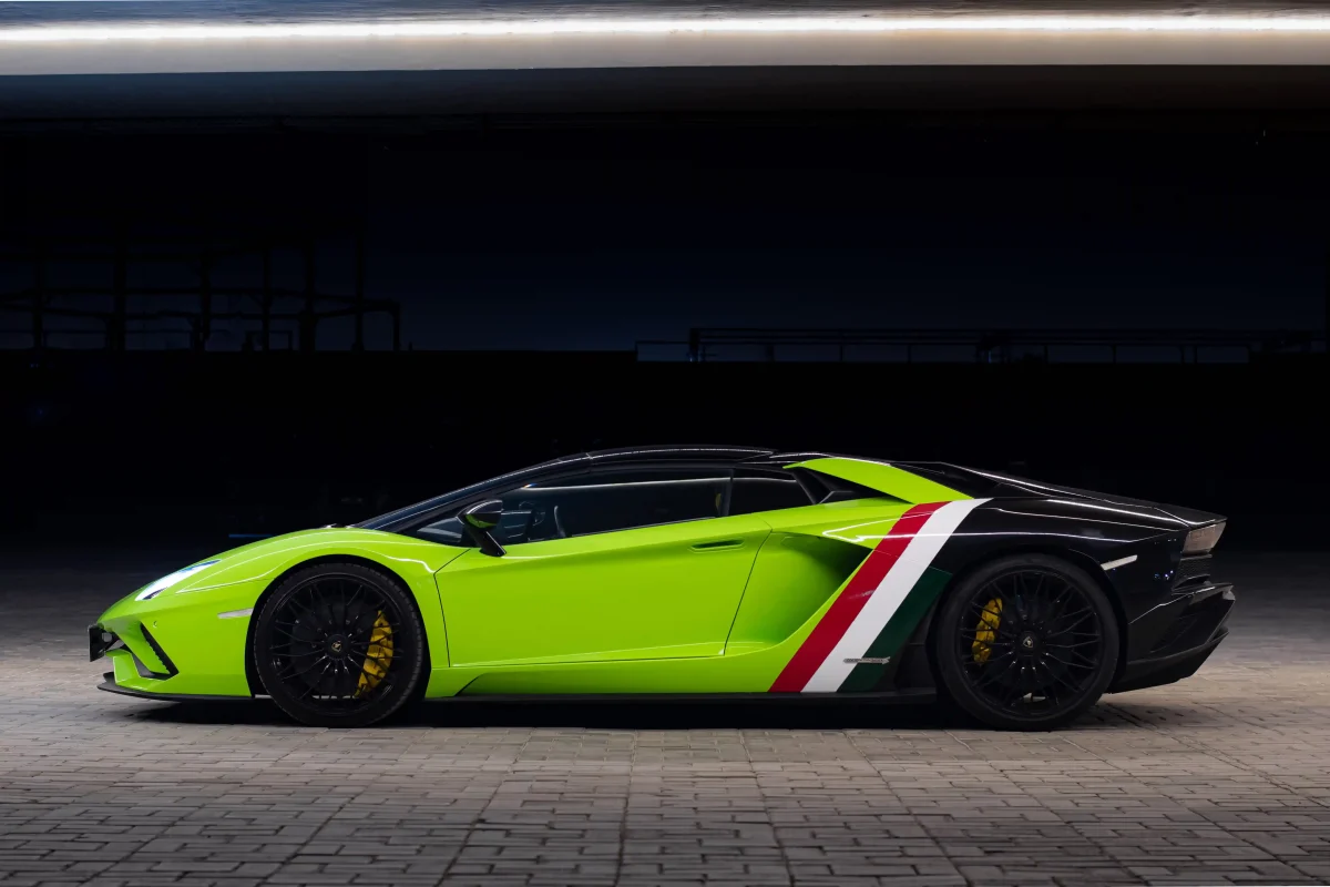 a picture of LAMBORGHINI AVENTADOR S ROADSTER available for rental in dubai with side view