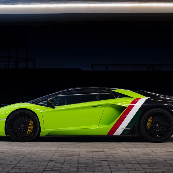 a picture of LAMBORGHINI AVENTADOR S ROADSTER available for rental in dubai with side view