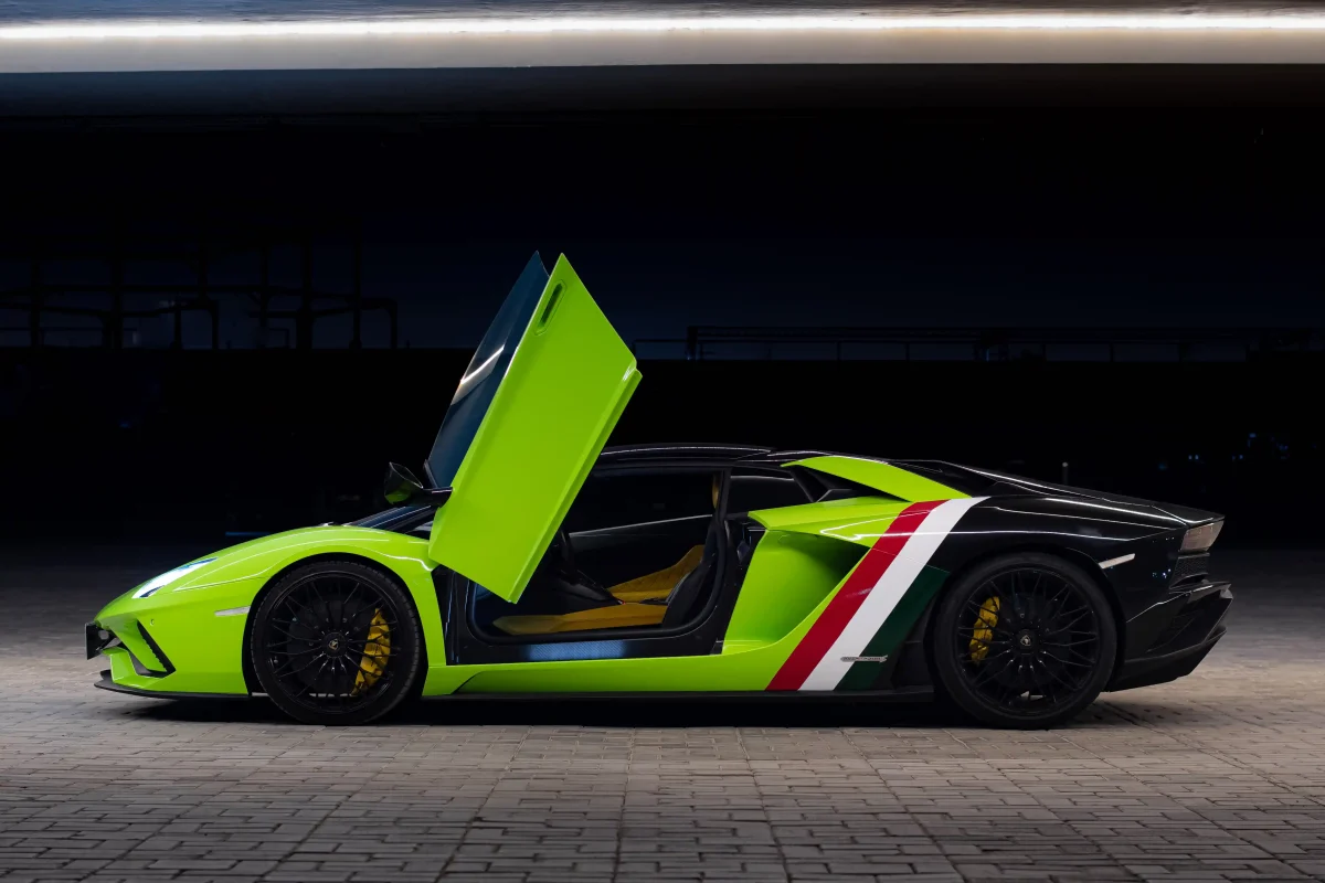 a picture of LAMBORGHINI AVENTADOR S ROADSTER available for rental in dubai with side view