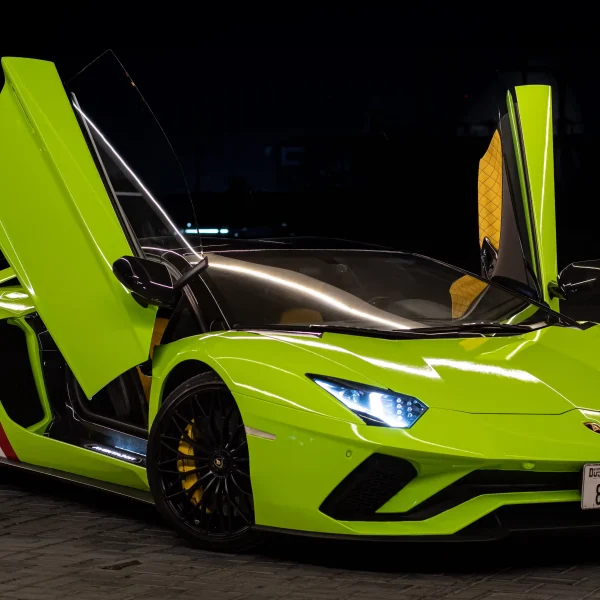 a picture of LAMBORGHINI AVENTADOR S ROADSTER available for rental in dubai with scissor doors view