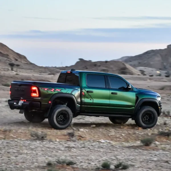 a picture of Dodge Trx 6.2L Venom Green edition available for rental in dubai with side profile view