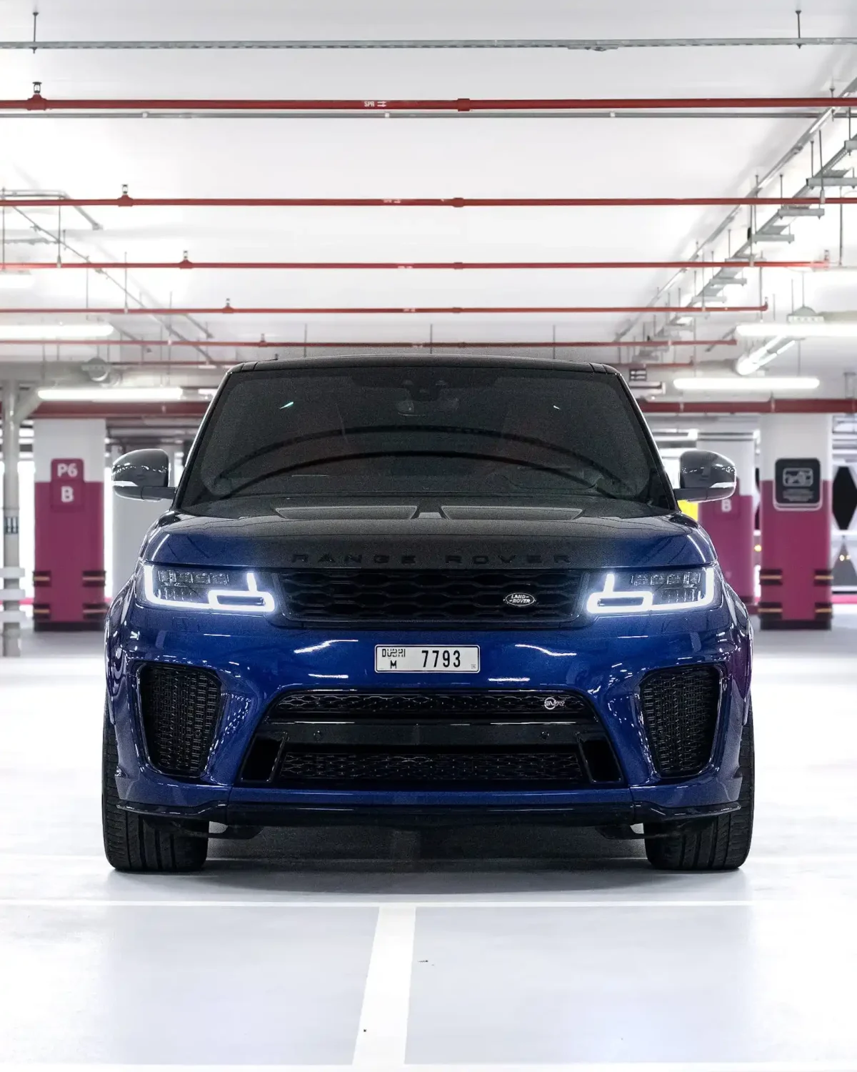 a picture of range rover sport svr with headlight and drl