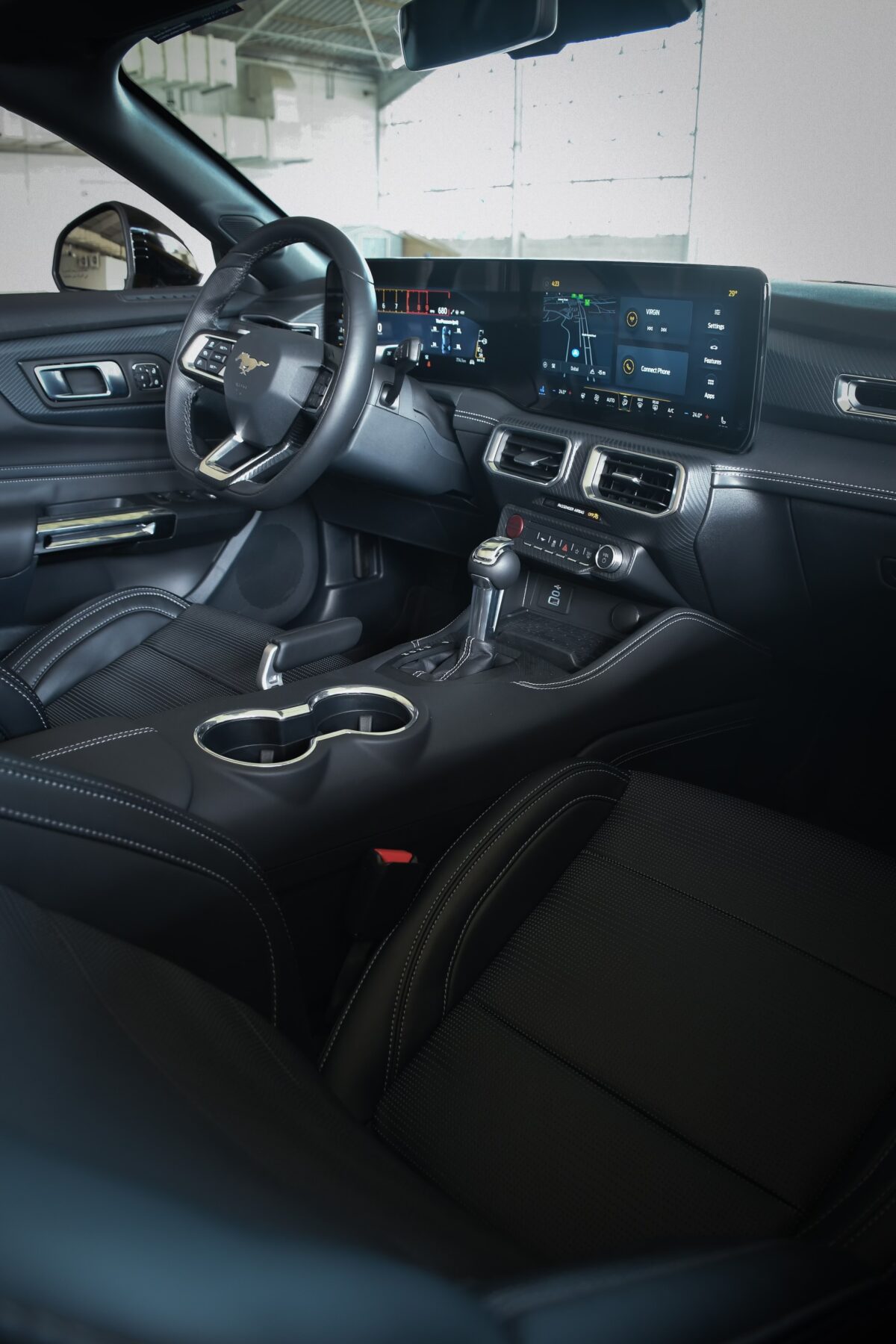 a picture of Ford Mustang V8 with media center view