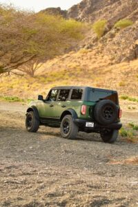 a picture of Ford Bronco with back side profile view view