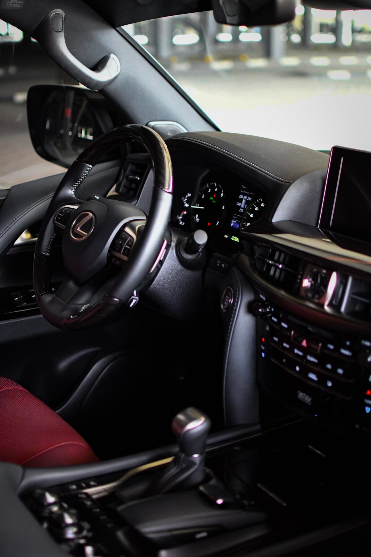 a picture of Lexus LX570 with dashboard view