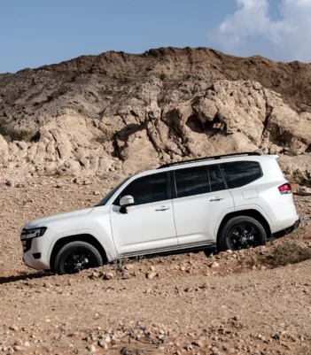 a photo of Toyota Land Cruiser Twin Turbo with side fender view